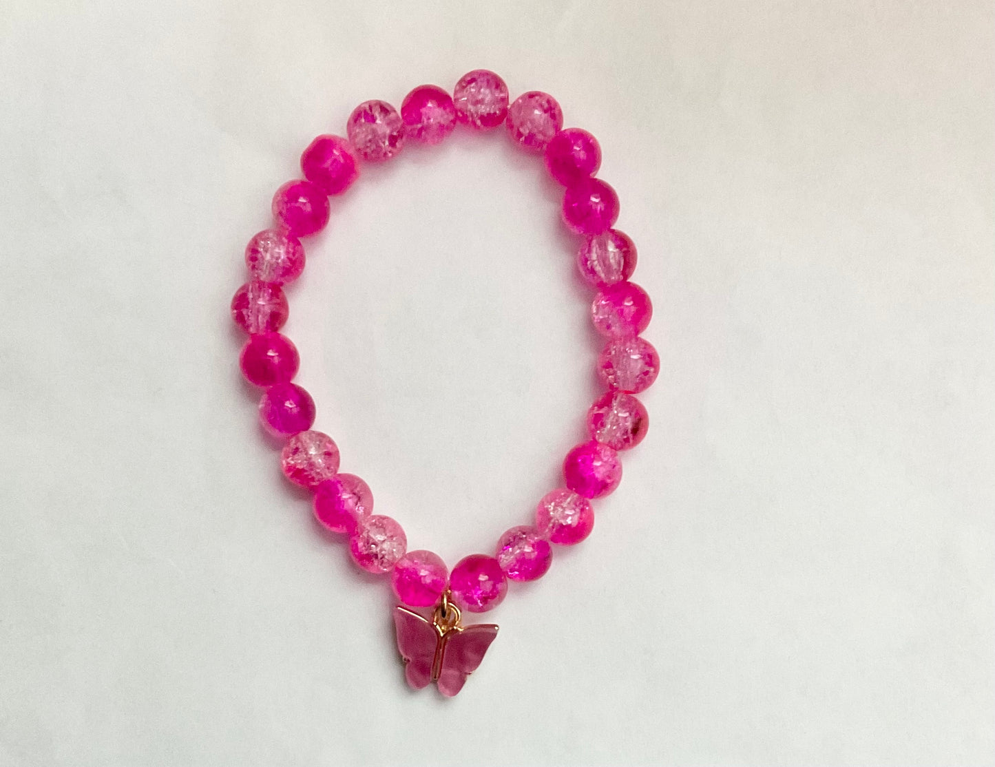 Pretty in pink butterfly charm glass beaded bracelet